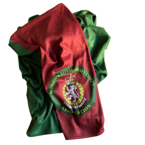 image of folded blanket, showing the colours and logo